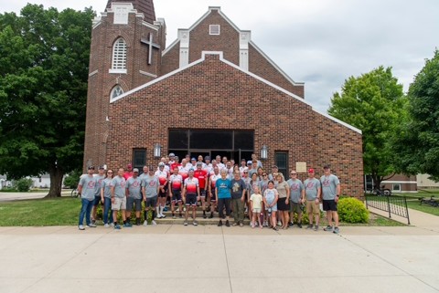Break the Cycle group gathered together at a church stop along the route
