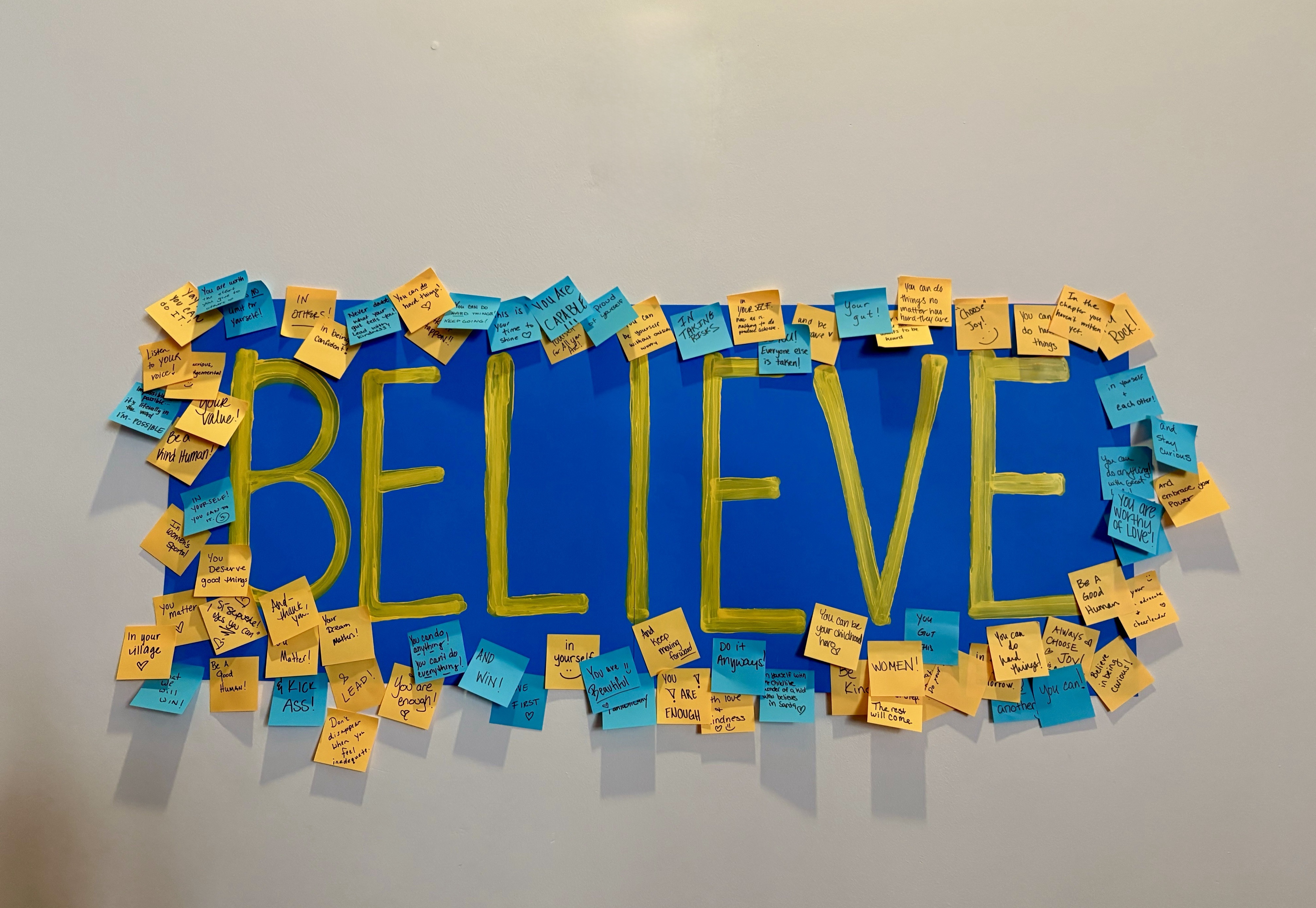 BELIEVE sign covered in sticky notes of encouragement at The Leadership Conference 2026