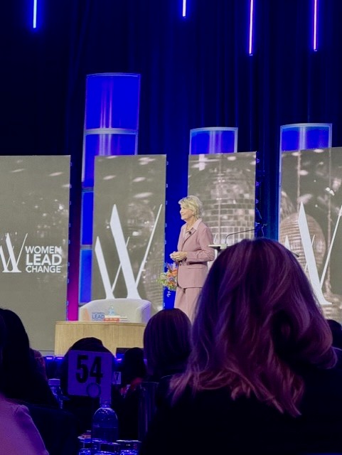 Lisa Bluder speaking on stage at The Leadership Conference 2026
